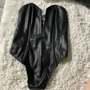 New one peace size small Victoria Secert black strapless must see leather .